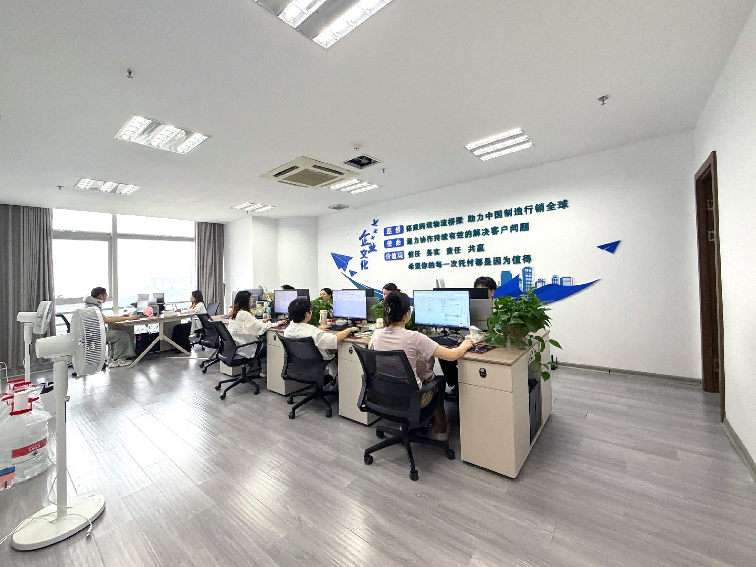 JCN staff working in the Yiwu office